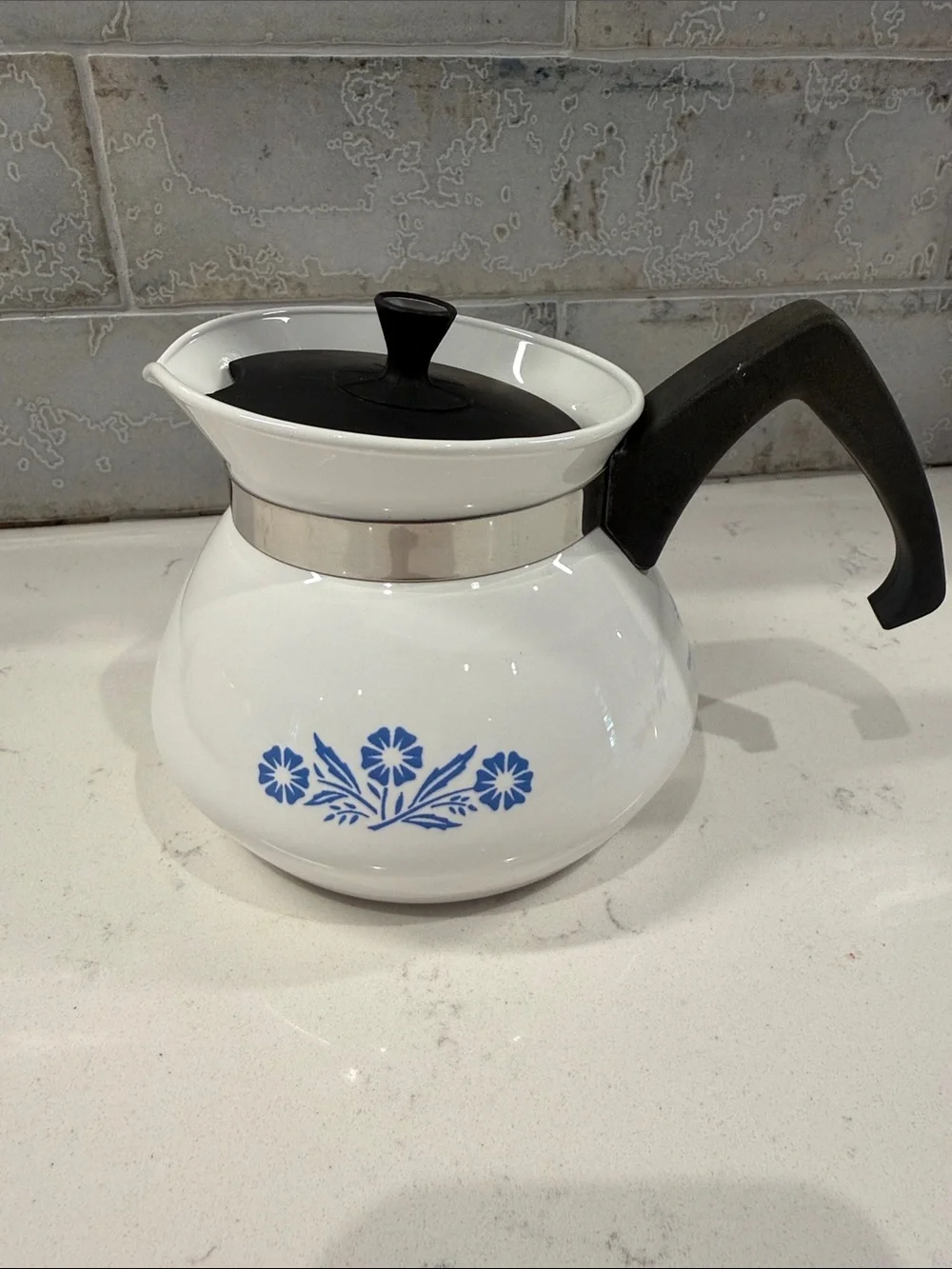 White Ceramic Corningware Teapot with Blue Floral Design and Black Handle